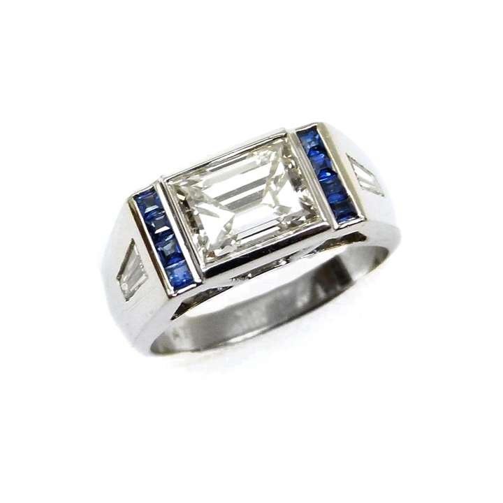 Single stone rectangular cut diamond ring
